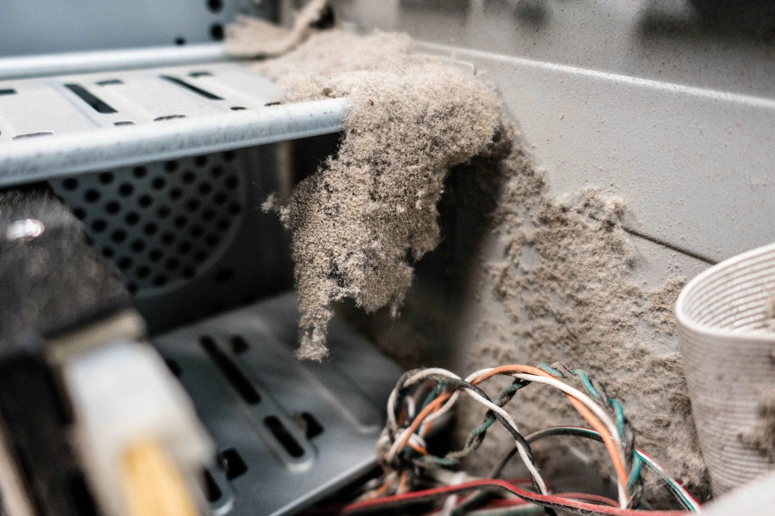 accumulated lint and dust inside a dryer vent in a kansas city home