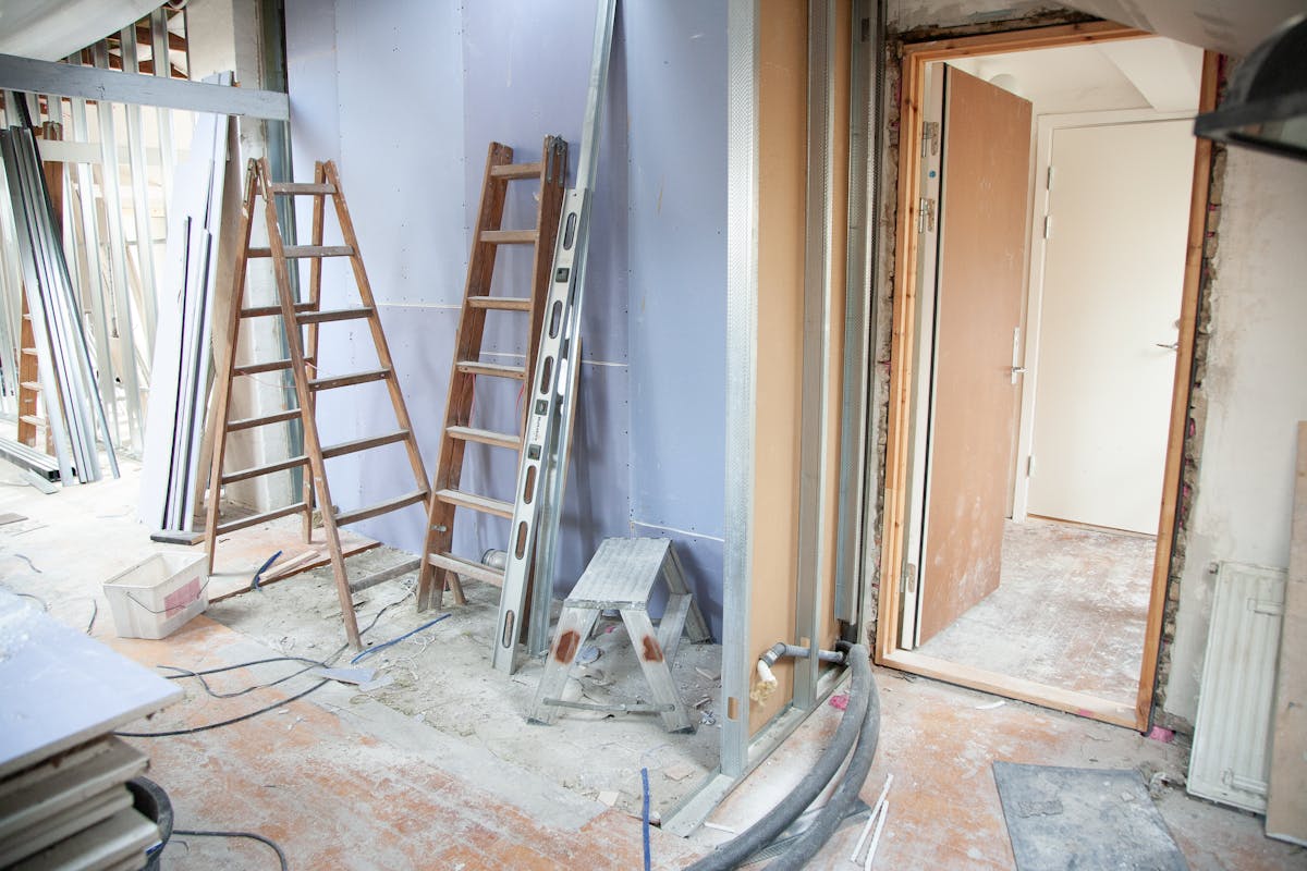 Kitchen remodel in progress where construction debris contaminates the duct system