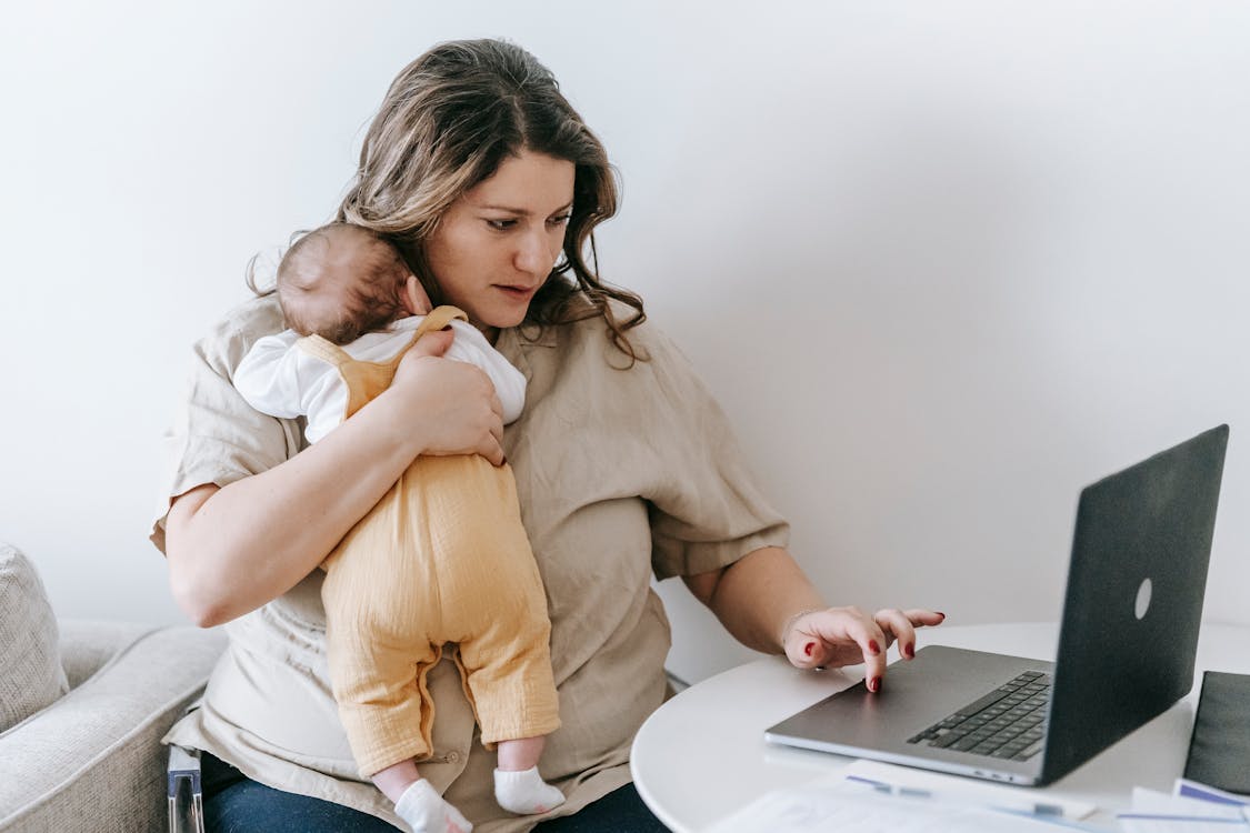 Parent holding baby in a clean healthy home with good indoor air quality